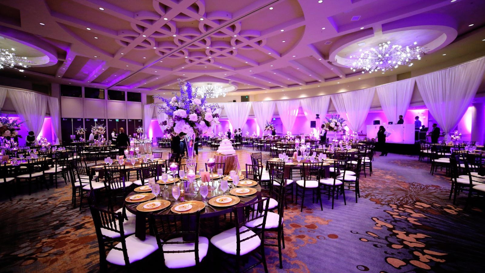 Corporate event ballroom with professional uplighting