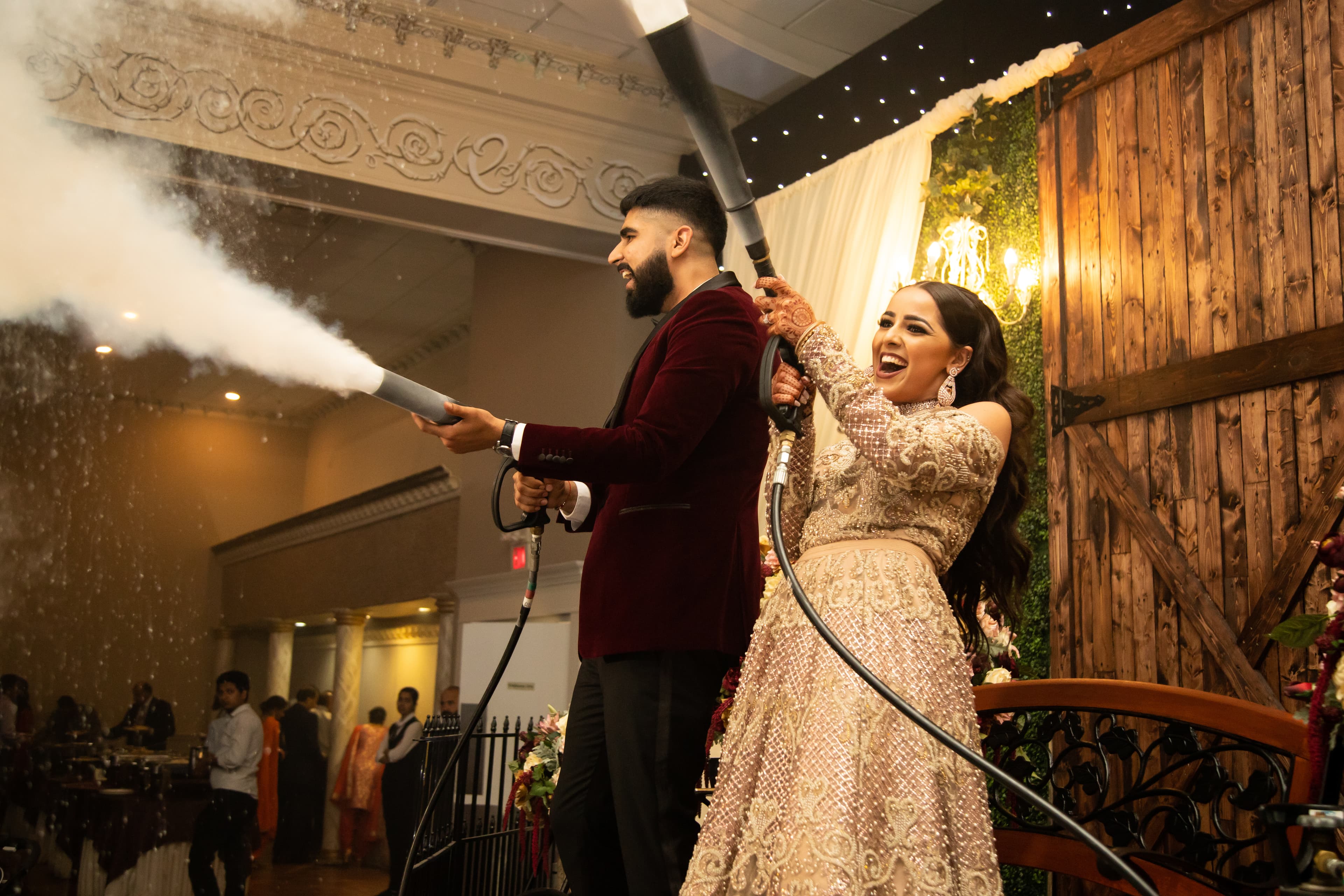 Couple with CO2 cannon at reception