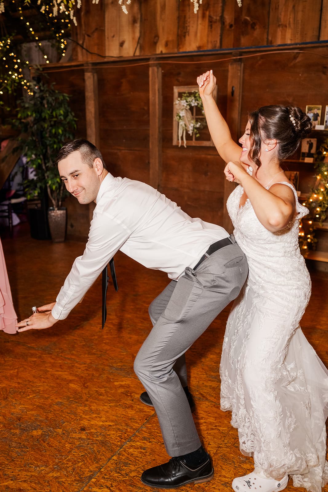 Couple dancing energetically at reception
