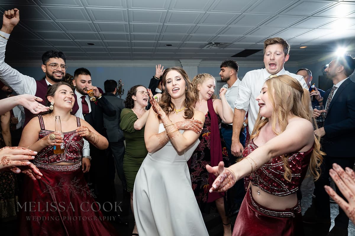 Packed dance floor at wedding reception