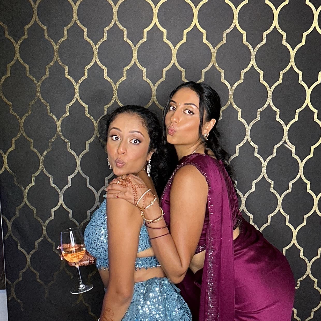 Sample photo booth template with custom design and gold geometric backdrop